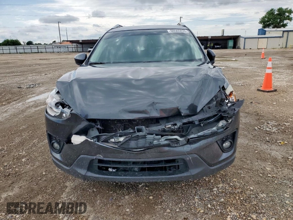 2014 Mazda CX-5 Touring z VIN JM3KE2CY7E0308580, wystawiony jako Copart lot #60565835 z przebiegiem 92 708 mil mil oraz Szkoda całkowita • Salvage title. Historia ofert i sprzedaży dostępna na DreamBid. Obrazek 5.