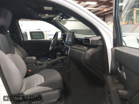 2025 Toyota Tacoma SR with VIN 3TMLB5JN2SM090394, listed as a IAAI auction lot 41916312 with 840 mi miles and . Bid and sale history available at DreamBid. Image 5.