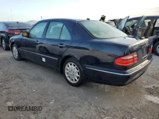 2000 Mercedes-Benz E-Class with VIN WDBJF65J7YB047628, listed as a Copart auction lot 75278704 with 0 mi miles and Salvage Title. Bid and sale history available at carsss.com. Image 2.