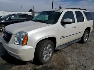 2011 GMC Yukon SLT with VIN 1GKS1CE05BR400428, listed as a Copart auction lot 43606335 with 0 mi miles and Salvage Title. Bid and sale history available at carsss.com. Image 1.