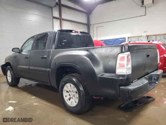 2006 Mitsubishi Raider LS with VIN 1Z7HC28K56S537721, listed as a Copart auction lot 83036764 with 114,576 mi miles and Salvage Title. Bid and sale history available at carsss.com. Image 2.