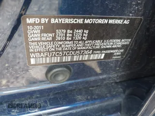 2012 BMW 5 Series 535i xDrive with VIN WBAFU7C57CDU57364, listed as a IAAI auction lot 41972047 with 150,000 mi miles. Bid and sale history available at carsss.com. Image 9.