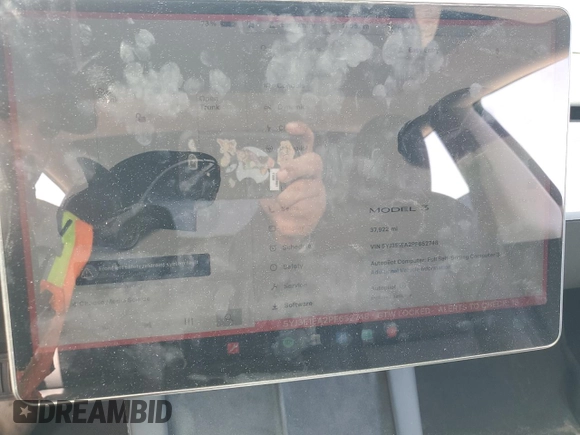 2023 Tesla Model 3 z VIN 5YJ3E1EA2PF652748, wystawiony jako Copart lot #57990705 z przebiegiem 37 922 mil mil oraz Szkoda całkowita • Salvage title. Historia ofert i sprzedaży dostępna na DreamBid. Obrazek 9.