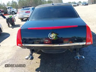 2006 Cadillac DTS Professional z VIN 1GEEH96Y56U550027, wystawiony jako IAAI lot #41663248 z przebiegiem 58 471 mil mil oraz . Historia ofert i sprzedaży dostępna na DreamBid. Obrazek 6.