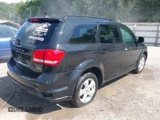 2012 Dodge Journey SXT with VIN 3C4PDCBG0CT352887, listed as a IAAI auction lot 42618786 with 201,008 mi miles and . Bid and sale history available at DreamBid. Image 4.