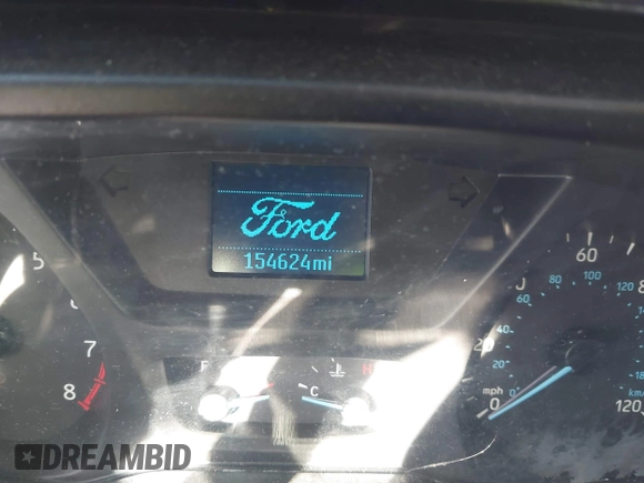 2019 Ford Transit Cargo with VIN 1FTBW3XM2KKB40981, listed as a IAAI auction lot 41558356 with 154,624 mi miles and . Bid and sale history available at DreamBid. Image 14.