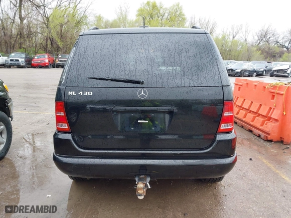 2001 Mercedes-Benz M-Class with VIN 4JGAB72E41A275216, listed as a IAAI auction lot 41953087 with 243,589 mi miles. Bid and sale history available at carsss.com. Image 16.