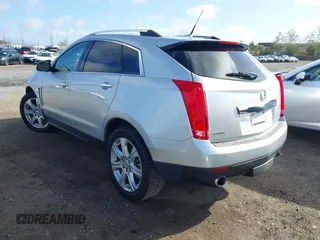 2014 Cadillac SRX Performance Collection with VIN 3GYFNCE39ES544135, listed as a IAAI auction lot 41808644 with 145,772 mi miles and . Bid and sale history available at carsss.com. Image 3.