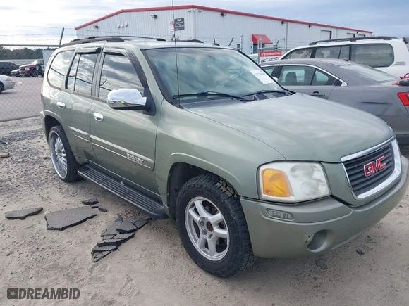 2004 GMC Envoy SLE with VIN 1GKDS13S442240682, listed as a IAAI auction lot 41764185 with 139,348 mi miles. Bid and sale history available at carsss.com. Image 1.