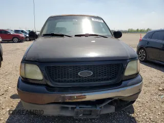 2003 Ford F-150 XLT with VIN 1FTRW07623KD82847, listed as a Copart auction lot 50303265 with 156,781 mi miles and Clean Title. Bid and sale history available at carsss.com. Image 5.