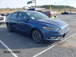2018 Ford Fusion Titanium with VIN 3FA6P0RU9JR120589, listed as a IAAI auction lot 41463194 with 74,025 mi miles and . Bid and sale history available at DreamBid. Image 1.