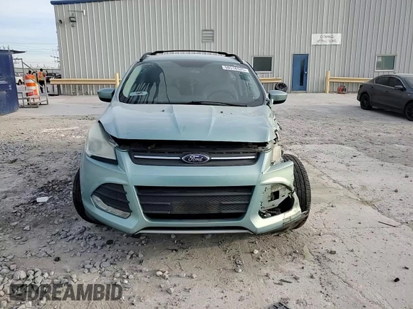 2013 Ford Escape SE with VIN 1FMCU0G97DUC34491, listed as a Copart auction lot 50516525 with 133,764 mi miles and Salvage title. Bid and sale history available at DreamBid. Image 12.