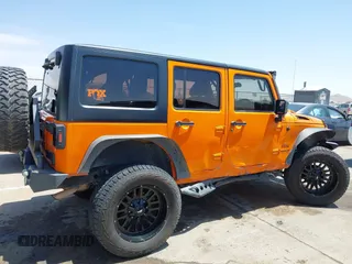 2012 Jeep Wrangler Unlimited Sport RHD with VIN 1C4BJWKGXCL221613, listed as a IAAI auction lot 42327004 with 129,375 mi miles and . Bid and sale history available at DreamBid. Image 13.