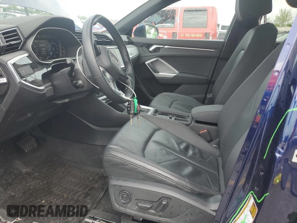 2021 Audi Q3 Premium with VIN WA1AUCF3XM1120717, listed as a Copart auction lot 54928885 with 25,833 mi miles and Salvage title. Bid and sale history available at DreamBid. Image 7.