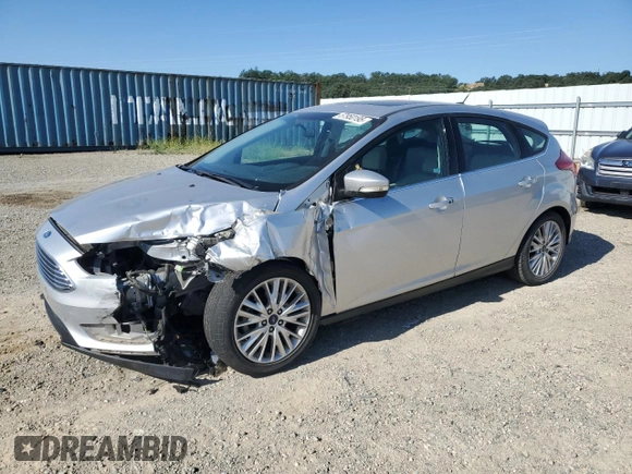 2017 Ford Focus Titanium with VIN 1FADP3N21HL279810, listed as a Copart auction lot 57950195 with 121,139 mi miles and Salvage title. Bid and sale history available at DreamBid. Image 1.
