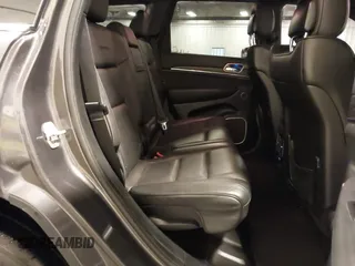 2015 Jeep Grand Cherokee Summit with VIN 1C4RJFJG4FC634129, listed as a IAAI auction lot 42481877 with 149,087 mi miles and . Bid and sale history available at DreamBid. Image 8.