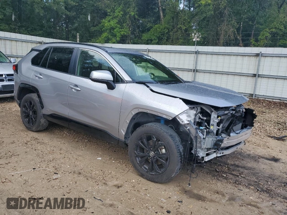 2023 Toyota RAV4 Hybrid SE с VIN JTM16RFV0PD084138, выставлен на аукционе Copart как лот 64999095 с пробегом 26 243 миль миль и Списание • Salvage title. История ставок и продаж доступна на DreamBid. Изображение 4.