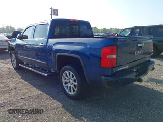 2015 GMC Sierra 1500 Denali z VIN 3GTP1WEC2FG201307, wystawiony jako IAAI lot #41931366 z przebiegiem 99 644 mil mil oraz . Historia ofert i sprzedaży dostępna na DreamBid. Obrazek 3.