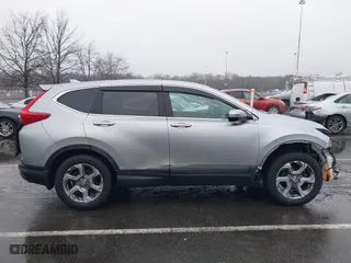 2018 Honda CR-V EX-L with VIN 7FARW2H88JE051829, listed as a IAAI auction lot 41517779 with 69,857 mi miles. Bid and sale history available at carsss.com. Image 13.