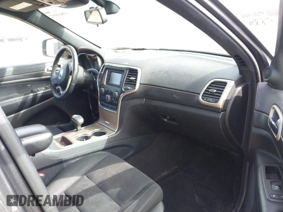2015 Jeep Grand Cherokee Laredo with VIN 1C4RJFAG6FC140581, listed as a IAAI auction lot 41869952 with 193,295 mi miles. Bid and sale history available at carsss.com. Image 5.