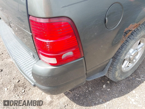2004 Ford Explorer XLT z VIN 1FMZU73WX4UA64464, wystawiony jako IAAI lot #42655296 z przebiegiem 212 510 mil mil oraz . Historia ofert i sprzedaży dostępna na DreamBid. Obrazek 13.