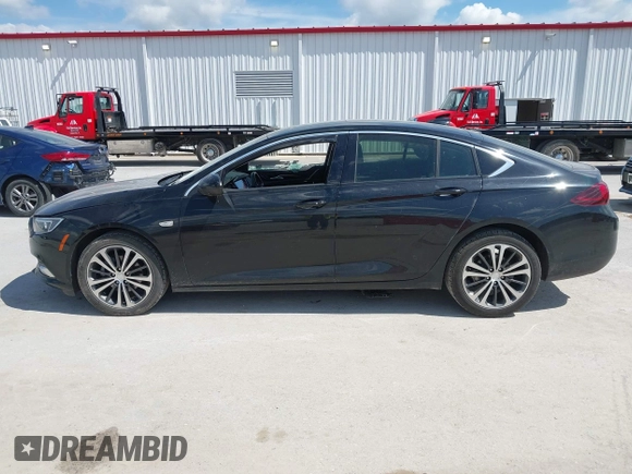 2018 Buick Regal Essence with VIN W04GP6SX5J1120700, listed as a IAAI auction lot 42334588 with 131,926 mi miles and . Bid and sale history available at DreamBid. Image 14.