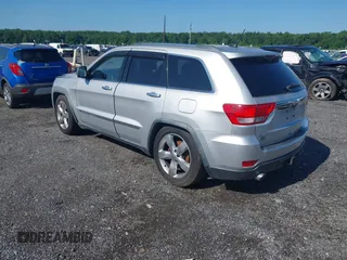 2011 Jeep Grand Cherokee Overland Summit with VIN 1J4RR6GT9BC535985, listed as a IAAI auction lot 42556913 with 108,845 mi miles and . Bid and sale history available at DreamBid. Image 3.