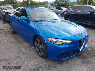 2017 Alfa Romeo Giulia with VIN ZARFAEDN9H7558626, listed as a IAAI auction lot 40517767 with 99,040 mi miles. Bid and sale history available at carsss.com. Image 1.