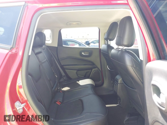 2017 Jeep Compass Latitude with VIN 3C4NJCBB2HT668657, listed as a IAAI auction lot 42027025 with 91,888 mi miles and . Bid and sale history available at DreamBid. Image 8.