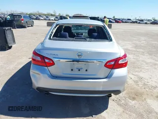 2016 Nissan Altima SR with VIN 1N4AL3AP3GC214309, listed as a IAAI auction lot 41863450 with 114,302 mi miles and . Bid and sale history available at carsss.com. Image 6.