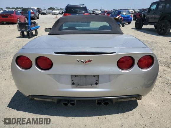 2007 Chevrolet Corvette z VIN 1G1YY36U975116245, wystawiony jako Copart lot #59045645 z przebiegiem 265 138 mil mil oraz Szkoda całkowita • Salvage title. Historia ofert i sprzedaży dostępna na DreamBid. Obrazek 6.