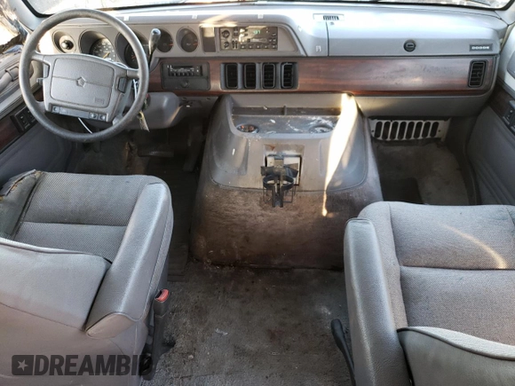1995 Dodge Cargo z VIN 2B7HB21Y3SK503648, wystawiony jako Copart lot #83202054 z przebiegiem 172 267 mil mil oraz Tytuł czysty. Historia ofert i sprzedaży dostępna na DreamBid. Obrazek 8.