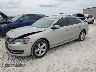 2014 Volkswagen Passat SE with VIN 1VWBT7A36EC049966, listed as a Copart auction lot 50833635 with 139,955 mi miles and Salvage title. Bid and sale history available at DreamBid. Image 1.