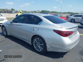 2019 Infiniti Q50 Luxe z VIN JN1EV7AP3KM510305, wystawiony jako IAAI lot #42225255 z przebiegiem 33 902 mil mil oraz . Historia ofert i sprzedaży dostępna na DreamBid. Obrazek 3.
