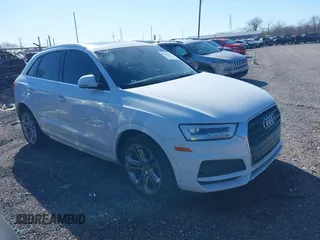 2018 Audi Q3 Premium Plus with VIN WA1HCCFS7JR025201, listed as a IAAI auction lot 41821438 with 121,293 mi miles. Bid and sale history available at carsss.com. Image 1.