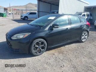 2014 Ford Focus ST with VIN 1FADP3L97EL199309, listed as a IAAI auction lot 41969919 with 174,344 mi miles and . Bid and sale history available at carsss.com. Image 18.