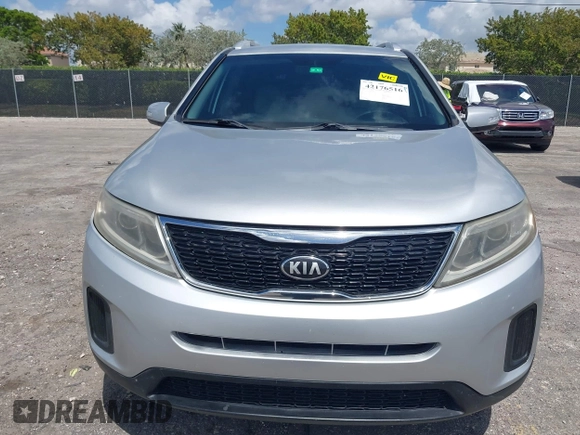 2014 Kia Sorento LX z VIN 5XYKT4A76EG502421, wystawiony jako IAAI lot #42176516 z przebiegiem 192 354 mil mil oraz . Historia ofert i sprzedaży dostępna na DreamBid. Obrazek 12.