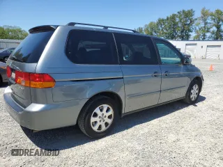 2002 Honda Odyssey EX-L with VIN 2HKRL18932H540391, listed as a Copart auction lot 65395405 with 119,239 mi miles and Clean title. Bid and sale history available at DreamBid. Image 3.