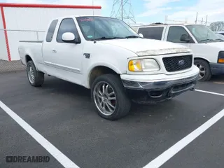 2000 Ford F-150 XL with VIN 1FTRX18W0YNA85809, listed as a IAAI auction lot 41848764 with 1 mi miles. Bid and sale history available at carsss.com. Image 1.