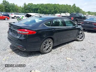 2017 Ford Fusion SE with VIN 3FA6P0H98HR331628, listed as a IAAI auction lot 42730977 with 47,248 mi miles and . Bid and sale history available at DreamBid. Image 4.