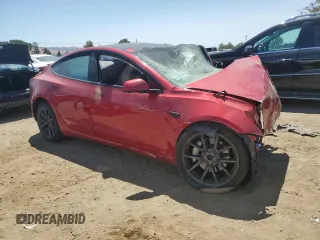 2022 Tesla Model 3 Long Range z VIN 5YJ3E1EB9NF357314, wystawiony jako Copart lot #61461405 z przebiegiem 39 506 mil mil oraz Czysty tytuł • Clean title. Historia ofert i sprzedaży dostępna na DreamBid. Obrazek 4.