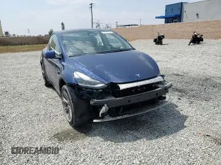 2024 Tesla Model Y z VIN 7SAYGDED3RF006264, wystawiony jako Copart lot #55210365 z przebiegiem 19 394 mil mil oraz Szkoda całkowita • Salvage title. Historia ofert i sprzedaży dostępna na DreamBid. Obrazek 14.