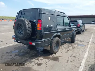 2004 Land Rover Discovery SE with VIN SALTW19464A860565, listed as a IAAI auction lot 42019860 with 153,274 mi miles. Bid and sale history available at carsss.com. Image 4.