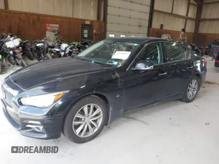 2015 Infiniti Q50 Premium z VIN JN1BV7AR9FM423471, wystawiony jako IAAI lot #42641857 z przebiegiem 86 919 mil mil oraz . Historia ofert i sprzedaży dostępna na DreamBid. Obrazek 19.