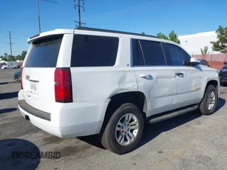 2020 Chevrolet Tahoe LT with VIN 1GNSCBKC0LR195687, listed as a IAAI auction lot 42620344 with 48,059 mi miles and . Bid and sale history available at DreamBid. Image 4.