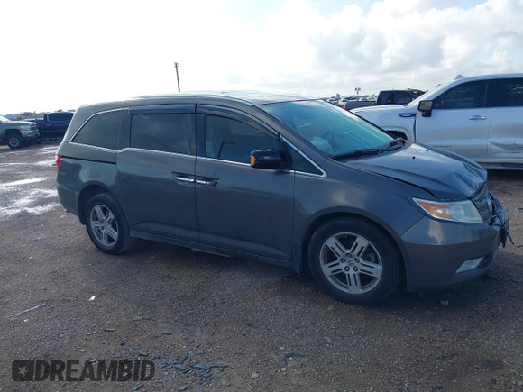 2011 Honda Odyssey Touring with VIN 5FNRL5H93BB104436, listed as a IAAI auction lot 40426003 with 93,342 mi miles and . Bid and sale history available at DreamBid. Image 1.