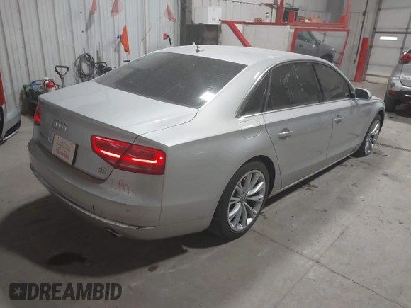 2011 Audi A8 with VIN WAURVAFD5BN014214, listed as a IAAI auction lot 41396044 with 131,764 mi miles and . Bid and sale history available at DreamBid. Image 4.