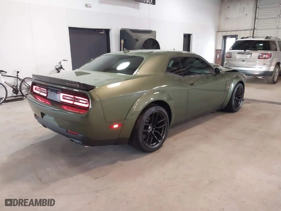 2023 Dodge Challenger R/T Scat Pack with VIN 2C3CDZFJ7PH680575, listed as a IAAI auction lot 41752010 with 1,787 mi miles. Bid and sale history available at carsss.com. Image 4.