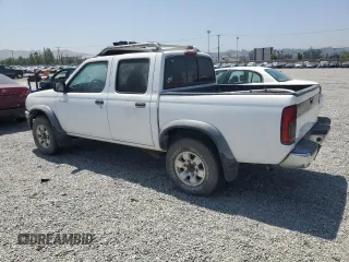 2000 Nissan Frontier XE with VIN 1N6ED27T8YC436513, listed as a Copart auction lot 60338695 with 307,757 mi miles and Clean title. Bid and sale history available at DreamBid. Image 2.