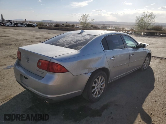 2011 Buick Lucerne CXL with VIN 1G4HC5EM7BU148074, listed as a Copart auction lot 50643555 with 127,734 mi miles and Salvage Title. Bid and sale history available at DreamBid. Image 3.